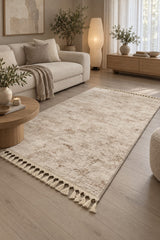 Raised Abstract Modern Area Rug – Beige in a living room