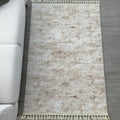 Raised Abstract Modern Area Rug – Beige in a living room