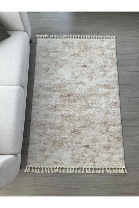 Raised Abstract Modern Area Rug – Beige in a living room