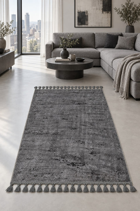 Raised Abstract Modern Area Rug – Charcoal in a living room