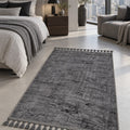 Raised Abstract Modern Area Rug – Charcoal in a bedroom