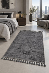 Raised Abstract Modern Area Rug – Charcoal in a bedroom