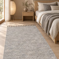 Raised Abstract Modern Area Rug – Gray in a bedroom