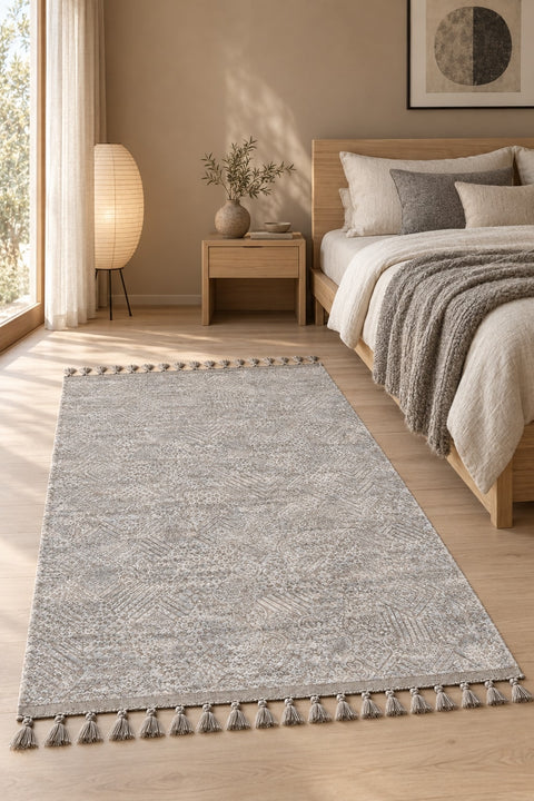Raised Abstract Modern Area Rug – Gray in a bedroom