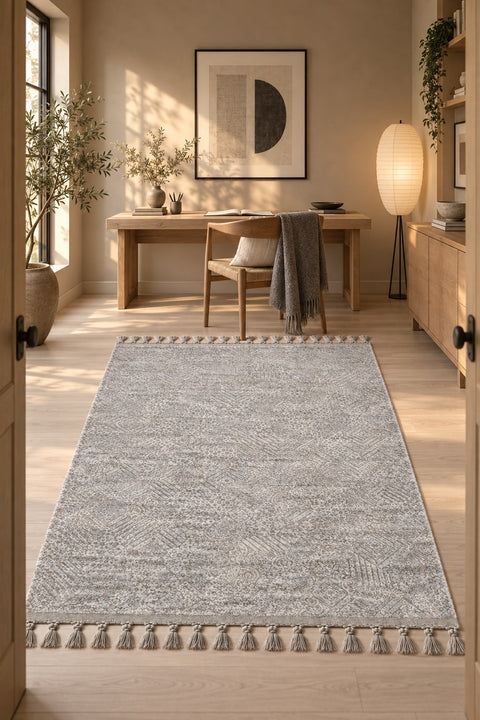 Raised Abstract Modern Area Rug – Gray in a office