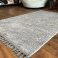 Raised Abstract Modern Area Rug – Gray in a living room