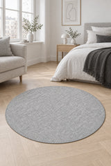 Sisal Look Scandinavian Area Rug – Gray in a bedroom