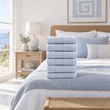 Solid Cotton Hand Towel Set of 6 – Blue in a bedroom