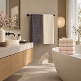 Solid Cotton Hand Towel Set of 6 – Blush, Beige & Charcoal in a bathroom
