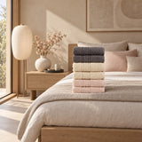 Solid Cotton Hand Towel Set of 6 – Blush, Beige & Charcoal in a bedroom