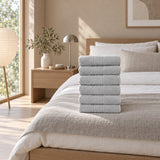 Solid Cotton Hand Towel Set of 6 – Gray in a bedroom