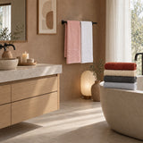 Solid Cotton Hand Towel Set of 6 – Honey in a bathroom