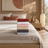 Solid Cotton Hand Towel Set of 6 – Honey in a bedroom