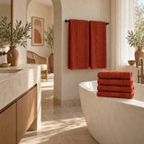 Solid Cotton Hand Towel Set of 6 – Terracotta in a bathroom