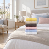Solid Cotton Hand Towel Set of 6 – White, Cream, Charcoal, Blush, Blue in a bedroom