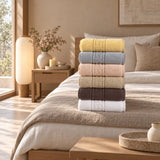 Solid Cotton Hand Towel Set of 6 – White, Cream, Charcoal, Blush, Gray in a bedroom
