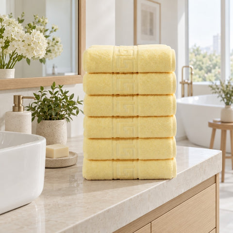 Solid Cotton Hand Towel Set of 6 – Yellow in a bathroom