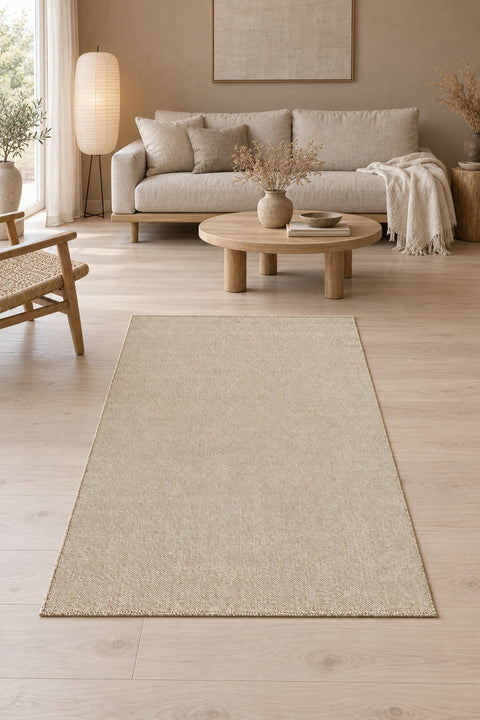 Solid Modern Area Rug – Beige in a living room
