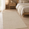 Solid Modern Area Rug – Beige in a bedroom