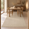 Solid Modern Area Rug – Beige in a dining room