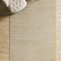Solid Modern Area Rug – Beige in a living room