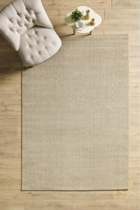 Solid Modern Area Rug – Beige in a living room