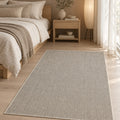 Solid Modern Area Rug – Brown in a bedroom