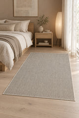 Solid Modern Area Rug – Brown in a bedroom