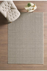 Solid Modern Area Rug – Brown in a living room