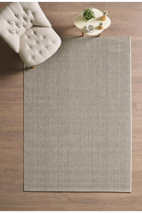Solid Modern Area Rug – Brown in a living room