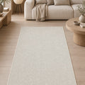 Solid Modern Area Rug – Cream in a living room
