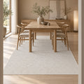 Solid Modern Area Rug – Cream in a dining room