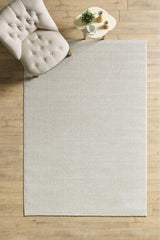Solid Modern Area Rug – Cream in a living room