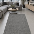 Solid Modern Area Rug – Gray in a living room