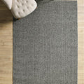 Solid Modern Area Rug – Gray in a living room