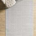 Solid Modern Area Rug – Light Gray in a living room