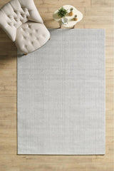 Solid Modern Area Rug – Light Gray in a living room