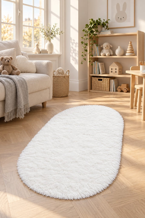 Solid Modern Oval Runner Rug in a nursery