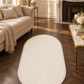 Solid Modern Oval Shag Rug – Brown in a living room