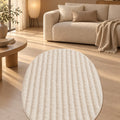 Solid Modern Oval Shag Rug – Cream in a living room