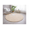 Solid Modern Round Plush Rug – Beige in a living room