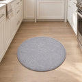 Solid Modern Round Plush Rug – Gray in a kitchen