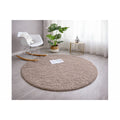 Solid Modern Round Plush Rug – Taupe in a living room