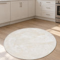 Solid Modern Round Plush Rug – White in a kitchen