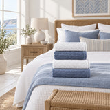 Striped Cotton Bath Towel Set of 4 – Indigo & White in a bedroom