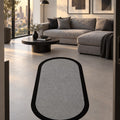 Striped Modern Oval Kitchen Rug – Gray in a living room