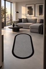 Striped Modern Oval Kitchen Rug – Gray in a living room