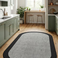 Striped Modern Oval Kitchen Rug – Gray in a kitchen