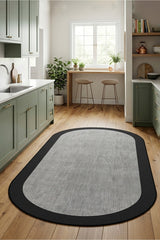 Striped Modern Oval Kitchen Rug – Gray in a kitchen