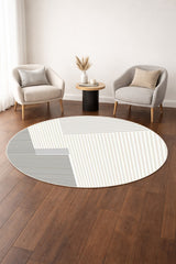 Striped Modern Round Area Rug – Gray in a living room